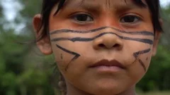 Closeup face of Native Brazilian children at an indigenous tribe in the Amazon
