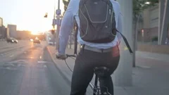 Entrepreneur riding a bike as he travels to work in the morning
