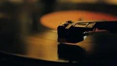 A retro-styled spinning record vinyl player. 4k. Close up