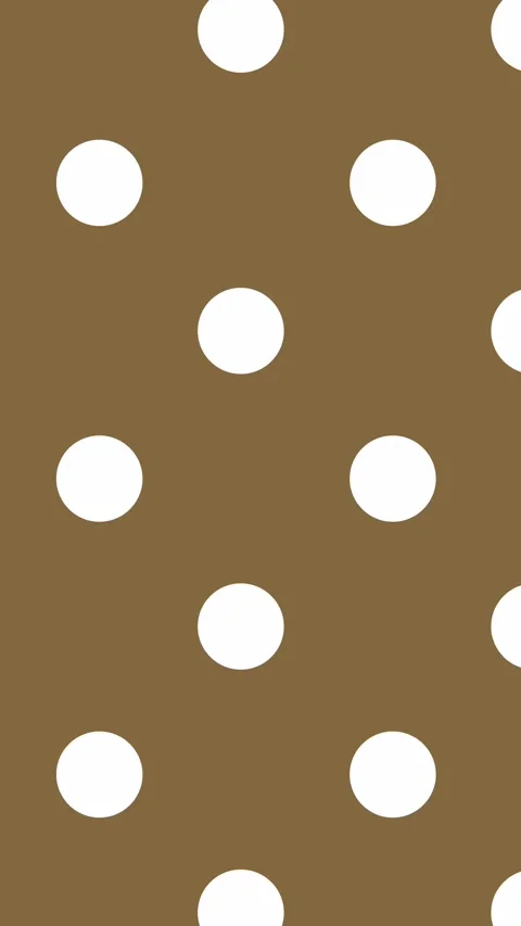 074_Polka dot pattern on brown background.mp4 Stock Footage 348100522