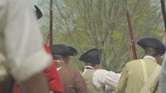 Revolutionary War soldiers fire at British lines