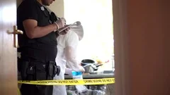 Crime scene site police tape forensic scientist murder collecting evidence bag