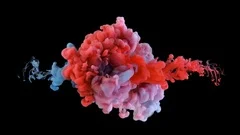Real shot color paint drops in water in slow motion. Ink swirling with alpha