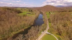 Bristol TN Aerial v1 Flying low over Holston river panning down in Tennessee
