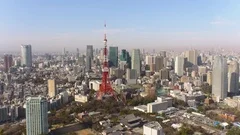 Japan Tokyo Aerial v33 Flying low backwards away from Tokyo tower cityscape