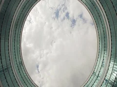 Time-lapse of the Sky Through a Circular, Loop-like Building