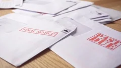 Debt Letters Piling Up with Bills Overdue, Past Due and Final Notice Red Writing