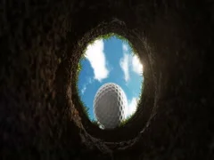 The golf ball gets into the hole, the hole view