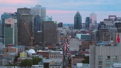 Montreal Quebec Aerial v79 Flying low across downtown with cityscape views dusk