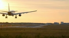 Widebody twin engine airplane landing at Frankfurt Am Main Airport at the early