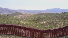 Aerial along the US Mexico border wall.