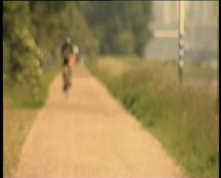 08 2men on bike Stock Footage 371211