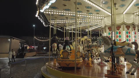 08 Dec, 2024. Bukovel resort, Ukraine. Illuminated Merry Go Round spinning. Stock Footage 295218634