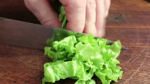 08. Vegetable Vegetarian Salad. Cutting Salad (close up) Video stock 131363692