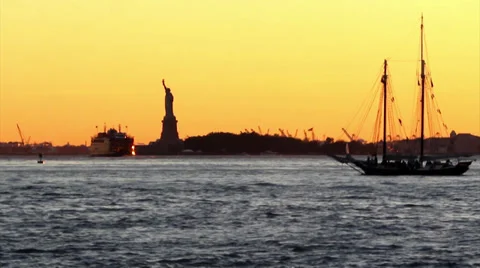 080 Statue of Liberty Sunset From Brooklyn Park A2 59s, New York Stock Footage 32021995
