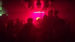 Nightclub Party with Excited Young Students Dancing with Strobe Lighting