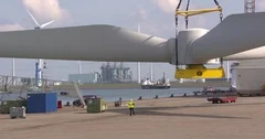 hoisting wind turbine rotor blades on board an offshore construction vessel