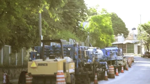 On 08/07/2023, skilled workers and machinery transform roads in San Salvado.. Stock-Footage 247876872