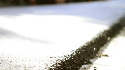 On 08/07/2023, skilled workers and machinery transform roads in San Salvado.. 動画素材 247876964