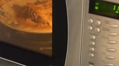 Jacket potato finishing cooking in microwave