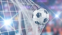 Beautiful Soccer Slow Motion Concept of the Ball flying into Goal Net. Fans
