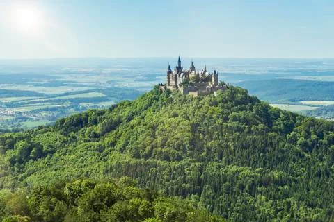 An  image  of  the  Castle  Hohenzollern  in  south  Germany xkwx hohenzollern,  castle,  swabian,  architecture,  germany,  burg,  europe,  building,  sun,  destination,  attraction,  fortress,  travel,  european,  famous,  beautiful,  sky,  tourism,  culture,  history,  landmark,  tourist,  sight,  blue,  green,  summer,  outdoor,  nobody,  romantic,  ancient,  historic
