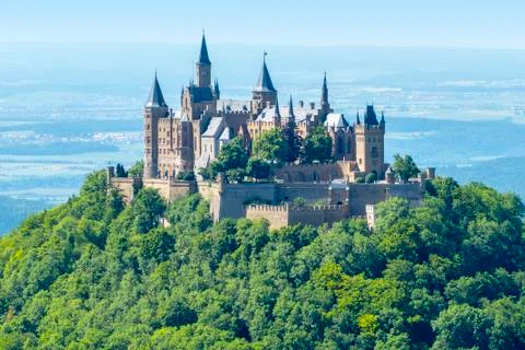 An  image  of  the  Castle  Hohenzollern  in  south  Germany xkwx hohenzollern,  castle,  swabian,  architecture,  germany,  burg,  europe,  building,  destination,  attraction,  fortress,  travel,  european,  famous,  beautiful,  sky,  tourism,  culture,  history,  landmark,  tourist,  sight,  blue,  green,  summer,  outdoor,  nobody,  romantic,  ancient,  historic