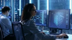 In Hi-Tech AI Research Center Female IT Engineer Working on a Neural Network 