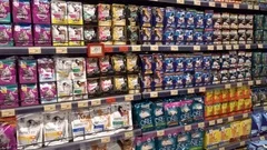 Forage for Animals Supermarket Shelf.  Various of Cat and Dog Food Products. 
