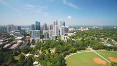 Atlanta Aerial v320 Flying low over Piedmont Park sunny full cityscape 9/17