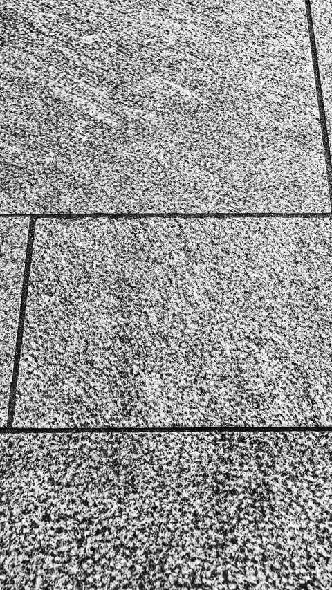 083_Textured granite paving stones pattern.mp4 Stock Footage 345817717