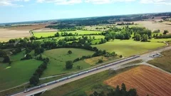 TGV very fast express train in rural France, drone aerial