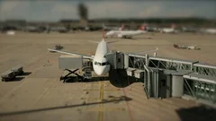 Time lapse of commercial airplane at airport terminal