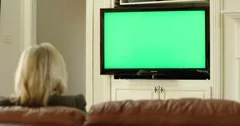 woman watching tv green screen replacement