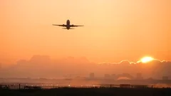 Airplane sunset take off