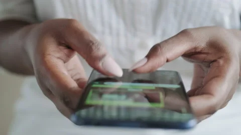 09 Black Girl Using Mobile Telephone For Internet Messages Whatsapp Stock Footage 130278743