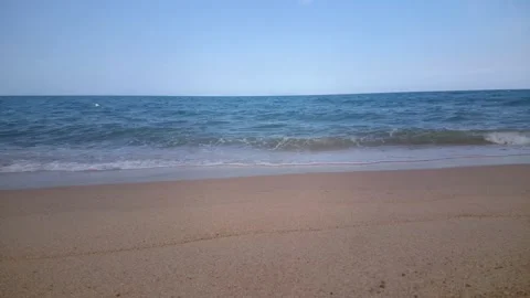 09 sandy beach with wave and breeze sound Stock Footage 145649368