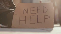 Close up sign homeless honeliness social cardboard homeless beggar face poverty
