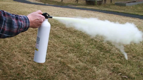 0916 Man Using a Fire Extinguisher, Slow Motion Stock Footage 36072017
