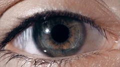 Technological lens on the eye. The concept of future technologies. Female eye