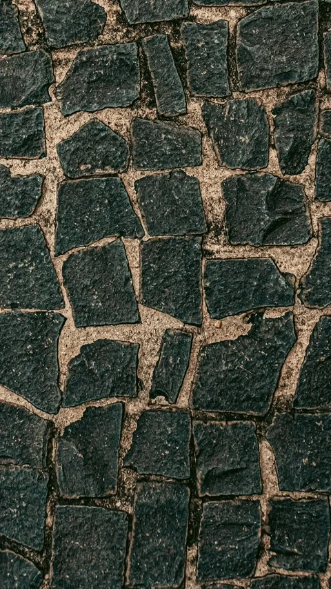 091_Dark cobblestone ground texture pattern.mp4 Stock Footage 345817776