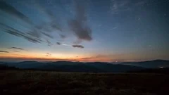 Starry night sky with stars and clouds Time lapse background