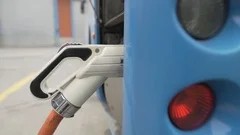 Electric charger connected to the bus, stock video