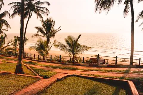 Panorama  landscape  view  of  a  beautiful  tropical  sea  beach  in  sunset  time  during  christmas  holiday.  (  MUMBAI,  MAHARASTRA,  INDIA).  Travel  vacation  and  holiday  concept. xkwx silhouette,  vacation,  sunrise,  resort,  summer,  sun,  sky,  paradise,  palm-tree,  travel,  coconut,  orange,  nature,  exotic,  dusk,  trees,  yellow,  island,  ocean,  evening,  background,  light,  twilight,  sunlight,  scenery,  tranquil,  scene,  water,  leaf,  sundown,  golden,  caribbean,  maldives,  tropic,  coastal-sand,  thailand,  holiday,  colorful,  shore-coast,  asia,  lagoon,  miami,  hawaii,  islands,  bali,  morning,  lucia,  bahamas,  jamaica,  wave