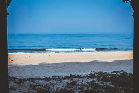 Panorama  landscape  view  of  a  beautiful  tropical  sea  beach  in  summertime  during  christmas  holiday.  (  MUMBAI,  MAHARASTRA,  INDIA).  Travel  vacation  and  holiday  concept. xkwx ocean,  wave,  clear-sky,  water,  background,  sand,  nature,  beauty,  outdoor,  coast,  foam,  sun,  shore,  cloud,  surf,  scenic,  relax,  blue,  sandy,  turquoise,  tranquil,  paradise,  tropic,  nobody,  sunshine,  natural,  horizon,  sunlight,  splash,  south,  exotic-bay,  amazing,  italy,  seaside,  portugal,  coconut,  idyllic-place,  lagoon,  coastline,  relaxation,  wonderful,  seashore,  scenery-calm,  sea-beach,  coastal,  tropical,  marine,  aqua,  wavy,  shoreline
