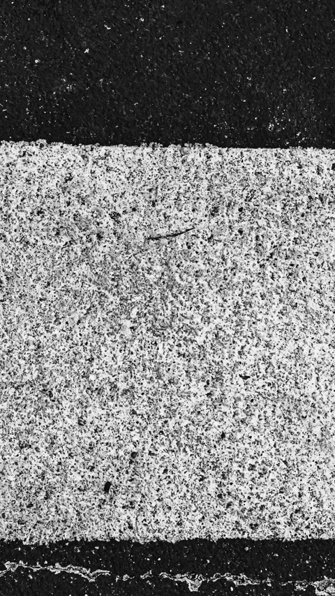 096_Black and white asphalt texture pattern.mp4 Stock Footage 345817826