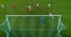 Soccer Player Receives Successful Pass, Kicks Ball with His Head and Make a Goal