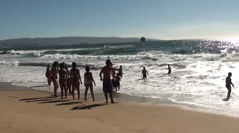 0992 Surfing the waves at Reñaca Beach, Viña del Mar, Chile Stock Footage 33912619