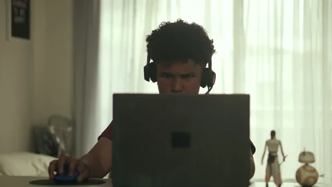 0Z TeenagerBoyPlayingGameComputer Stock Footage 234148657