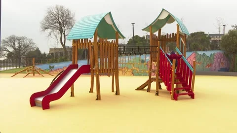 1-1 /5  Children playing on the Playground  Wood Carousel in the Park Stock Footage 212901740